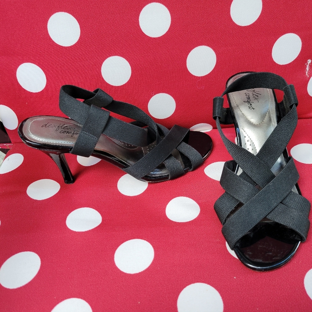 Dex Flex black sandals with elastic straps.